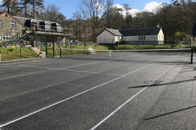 Our newly refurbished tennis court at Melfort Village Self Catering Cottages near Oban, Scotland
